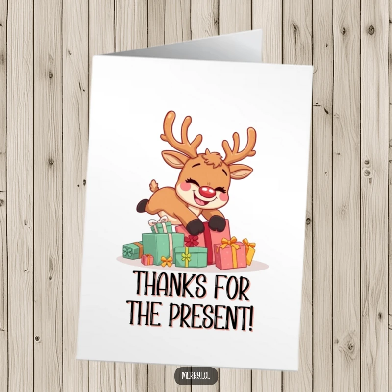 Funny Free Printable Thank You Card: Cute reindeer stumbling on presents, big goofy grin, humorous appreciation, downloadable.