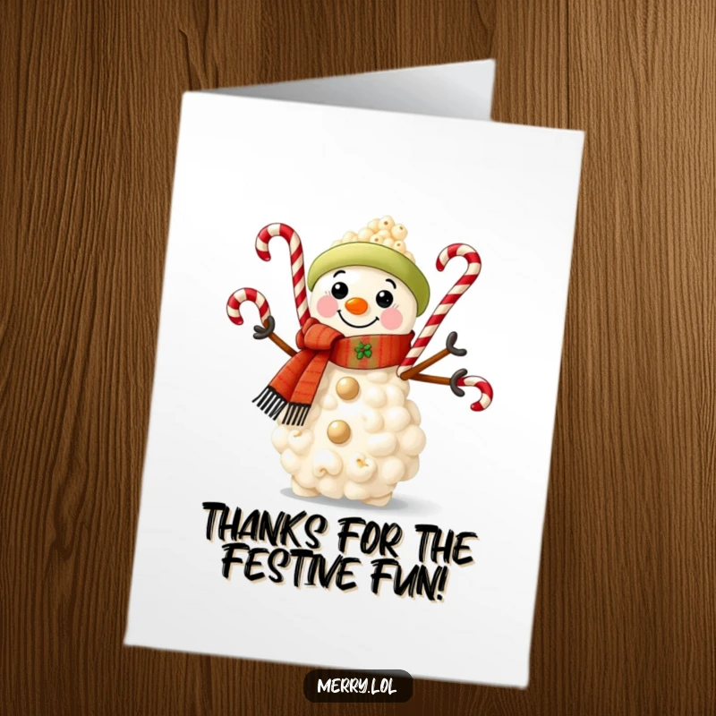 Free Printable Thank You Card: Popcorn snowman wearing scarf, juggling candy canes, cute and funny, downloadable.