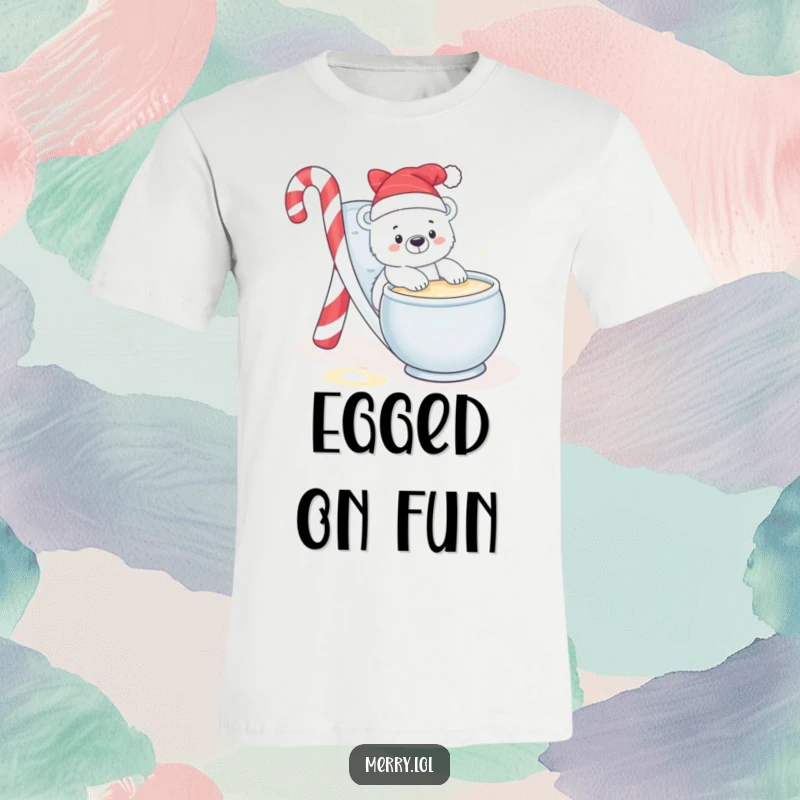 Funny t-shirt design of a baby polar bear sliding down a candy cane slide into a bowl of eggnog with a delighted expression.